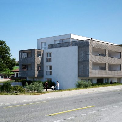 1 immeuble d’habitation comprenant 15 appartements, un espace commercial ainsi qu’un parking souterrain commun – Giffers