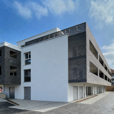 Immeuble d&rsquo;habitation comprenant 15 appartements et un espace commercial – Giffers